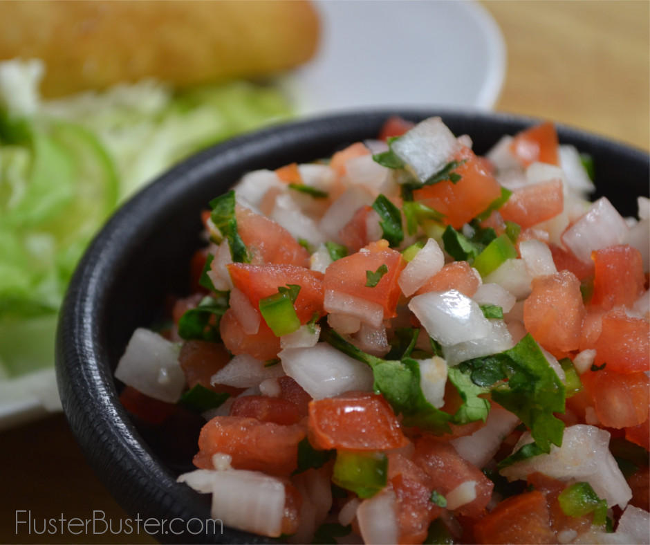 A simple recipe made from freshly chopped tomatoes, onions, cilantro and jalapenos, seasoned with a little garlic, salt and lime juice.