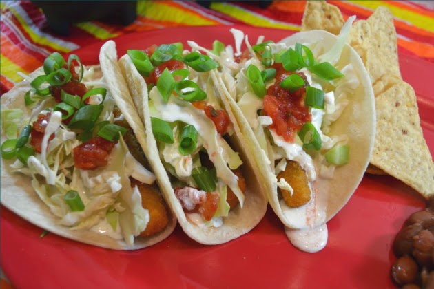 Simple Fish Tacos served with pinto beans and homemade tortilla chips can feed your family of 4 for around $5.00.