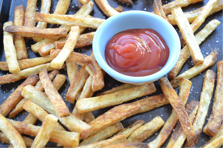 Baked French Fries, a guiltless indulgence! They contain considerably less fat than regular fried potatoes, they're simple but are still crispy and just as delicious.
