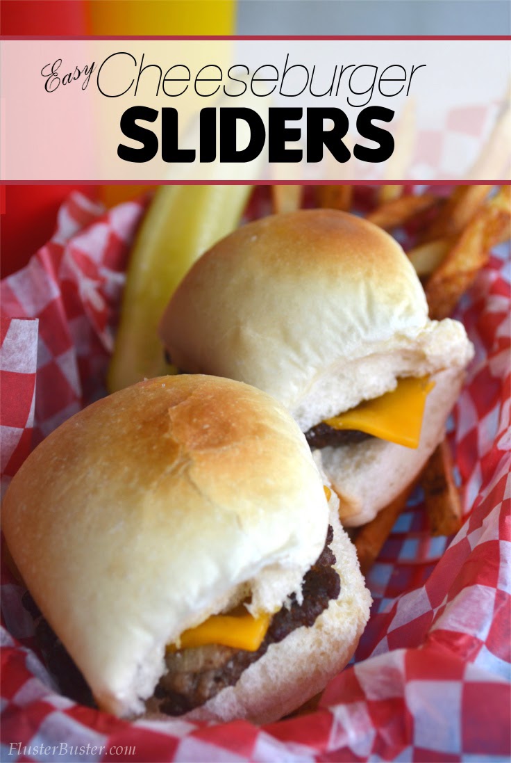 Simple Cheeseburger Sliders - Seasoned ground beef patties topped with cheddar cheese and served on a small sized bun.