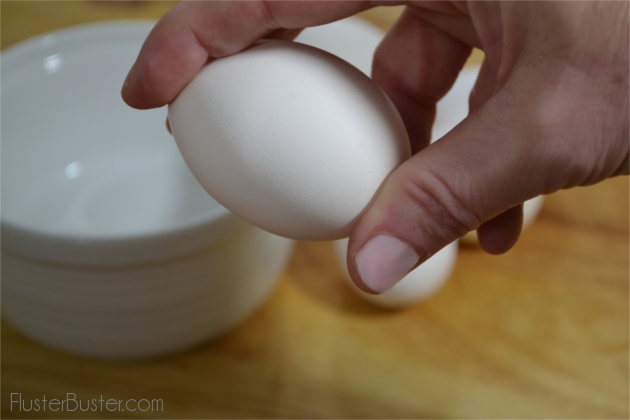 A method for cracking eggs that eliminates shell shards.