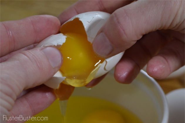 A method for cracking eggs that eliminates shell shards.