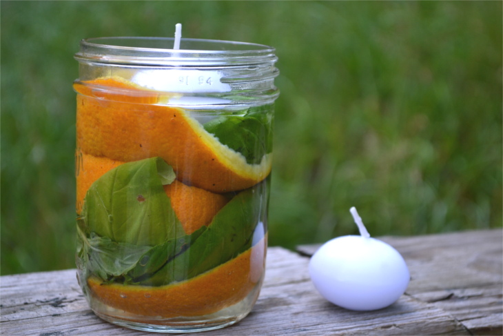 All-Natural Mosquito Repellent Candles - A few simple ingredients, a mason jar and a few minutes of time is all you need to keep those pesky mosquitoes away.