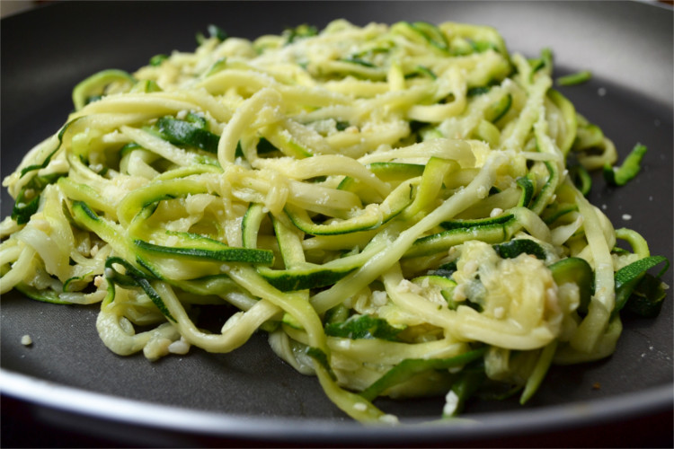 Buttered Parmesan Zoodles - A simple and healthy side dish bursting with tons of garlic flavor.