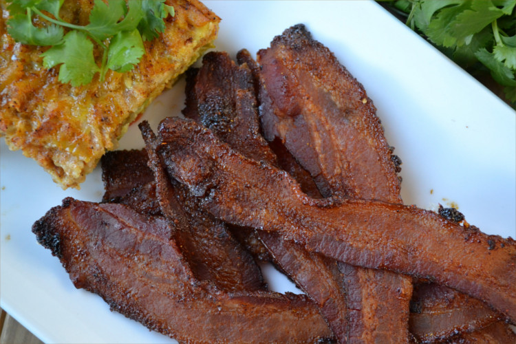 Simple Spicy Mexican Style Bacon Recipe - Thick smokey bacon flavored with a spicy and slightly sweet coating then cooked to crispy perfection in the oven.